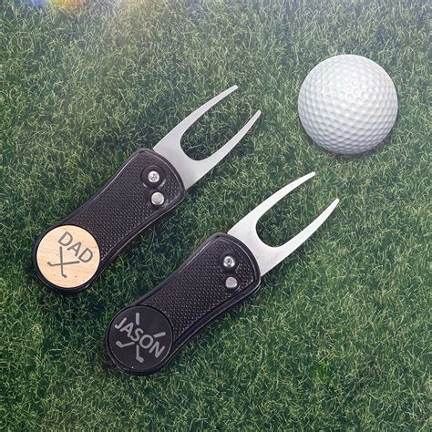 divot tool with ball marker.